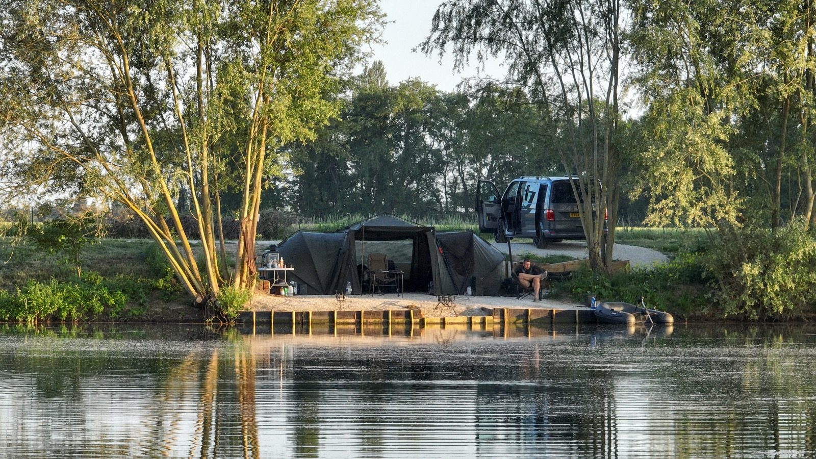 A bivvy on a swim across the lake in golden light